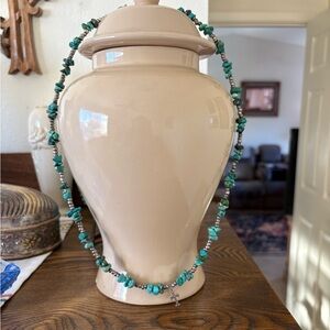 Turquoise and silver necklace with small silver cross native American
